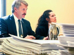Linda Henning seated beside attorney Gary Mitchell.