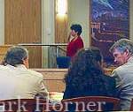 Mary Alice Thomas, wearing red, is sworn-in before testifying Thursday. Also pictured, Judge John Brennan, private investigator Dave Pfeffer, defendant Linda Henning and her attorney Gary Mitchell.